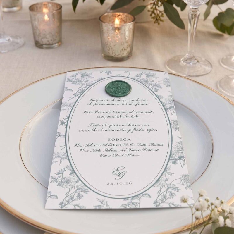 Menú de boda Elodie en papel verjurado con diseño botánico verde salvia y sello de lacre verde.
